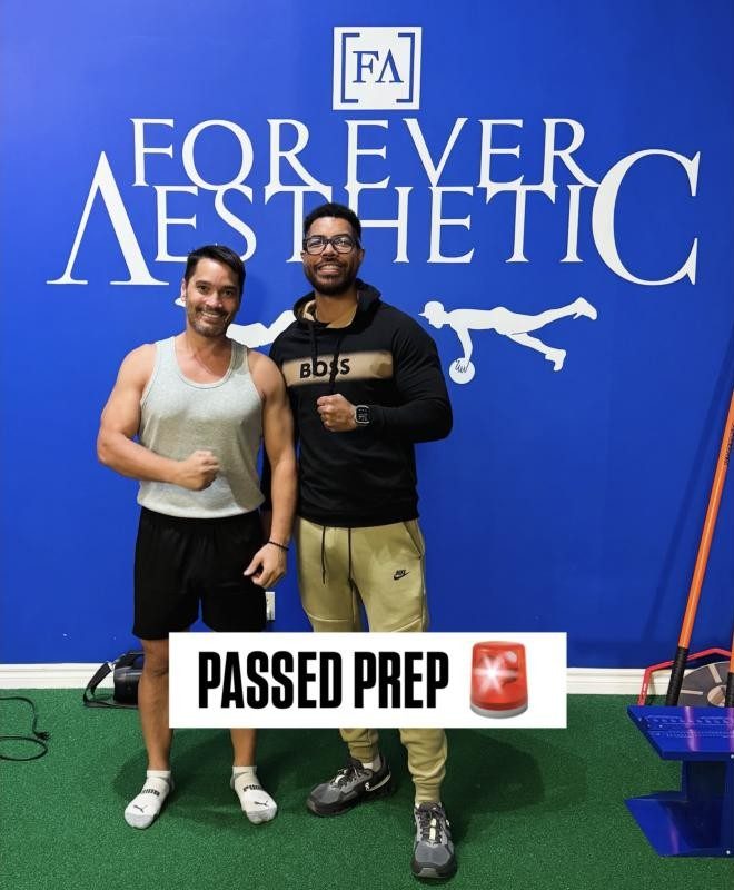 Rodney with his coach after passing the PREP